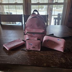 Coach 4 piece Disney princess set